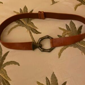 Another Line Inc Leather Belt Adjustable with Metal hook latch.
